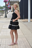 Black mini dress with ivory crochet trim