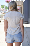 Beige shirt with embroidered lace trim detail