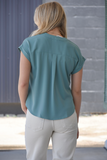 Teal v-neck blouse with pleated accent