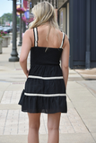 Black mini dress with ivory crochet trim