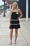 Black mini dress with ivory crochet trim