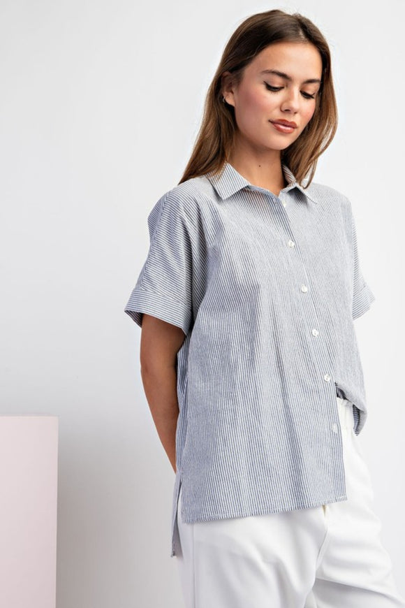 Navy and white striped short sleeve button-down top with a collar