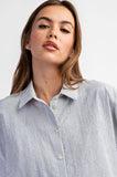 Navy and white striped short sleeve button-down top with a collar