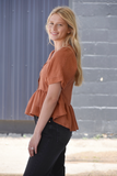 Copper flowy babydoll top with v-neck, striping, and buttons