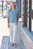 Teal v-neck blouse with pleated accent