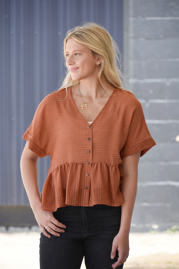 Copper flowy babydoll top with v-neck, striping, and buttons