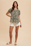 Black and beige floral women’s top with puff sleeves